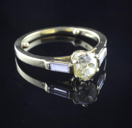 An 18ct gold fancy yellow oval cushion cut single stone diamond ring, size M.